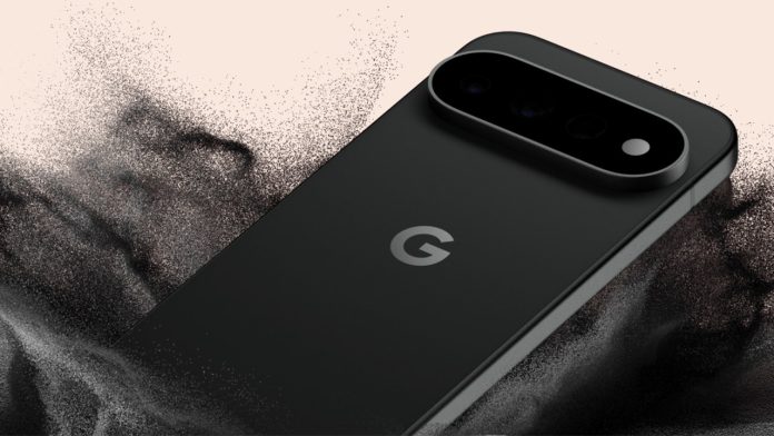 Google Pixel 11 Pro in black on a light background dropped into sand