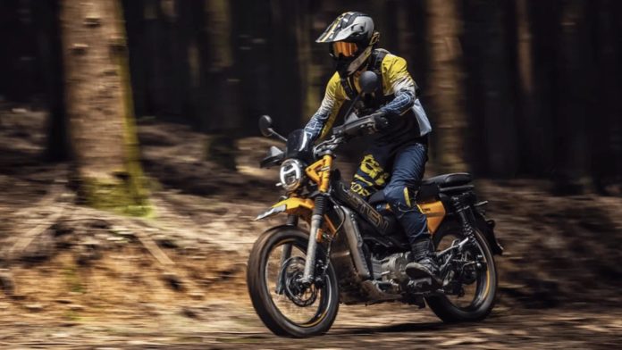 Leten LT190 riding in a forest. Credit: AJS Motorcycles.