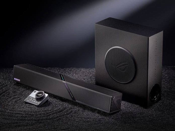 The desktop speaker setup costs around $548 in China. Pictured: a promo picture showing the soundbar, woofer, and the controller.