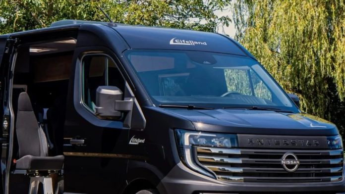 Black Nissan Interstar camper van with Eifelland branding and a black swivel seat extended outside the open side door.