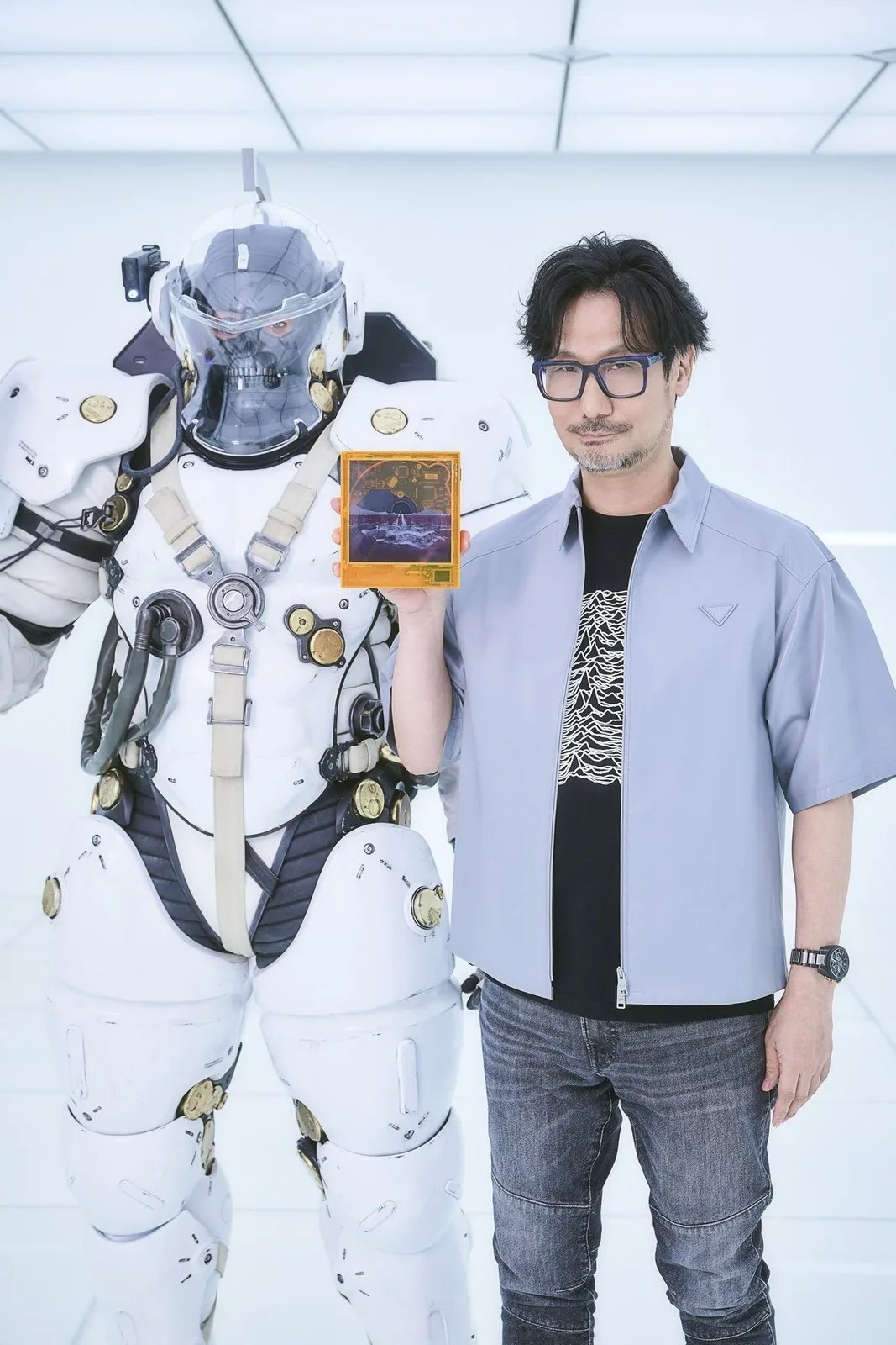 Transparent Death Stranding 2 CD player by Kojima mimics BB Pod nursery